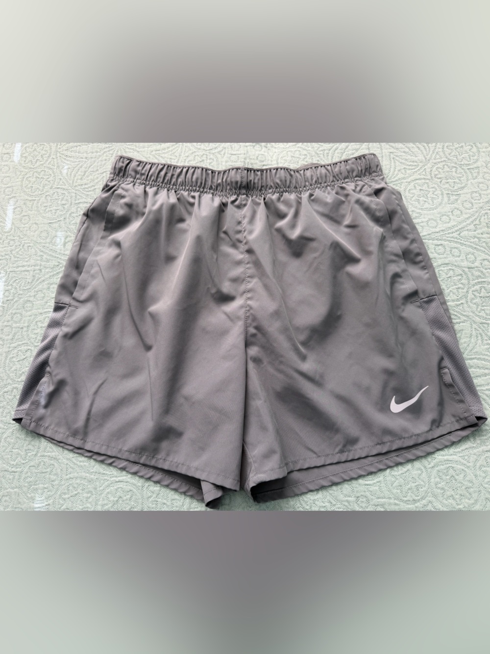 Nike Women's Gray Athletic Running Shorts with White Swoosh